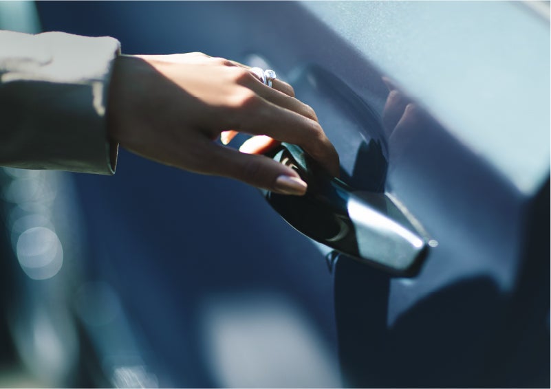 A hand gracefully grips the Light Touch Handle of a 2023 Lincoln Aviator® SUV to demonstrate its ease of use | Don Franklin Lincoln in London KY