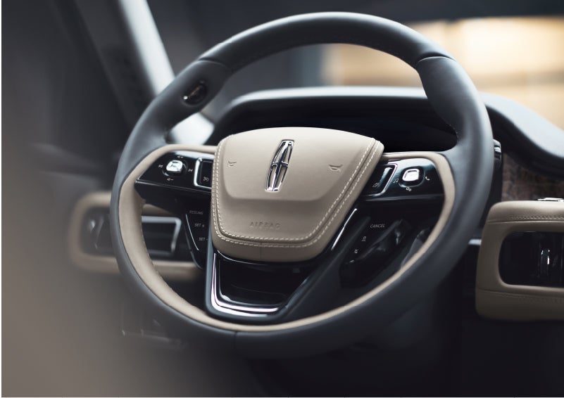 The intuitively placed controls of the steering wheel on a 2023 Lincoln Aviator® SUV | Don Franklin Lincoln in London KY