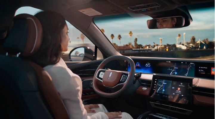 A person is shown driving hands-free on the highway with available Lincoln BlueCruise technology. | Don Franklin Lincoln in London KY