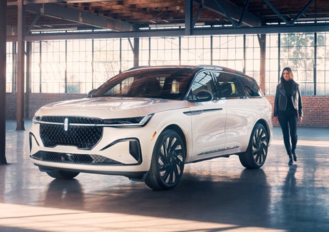 A person approaches a 2024 Lincoln Nautilus® SUV. | Don Franklin Lincoln in London KY
