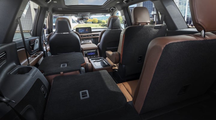 One side of the PowerFold® third-row seat and a second-row seat are folded forward in the 2026 Lincoln Aviator® SUV. | Don Franklin Lincoln in London KY