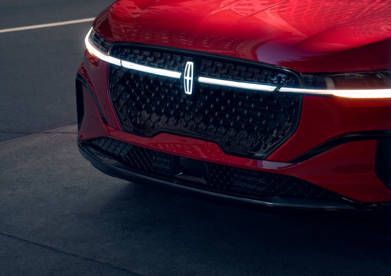 The available front LED light bar and center Lincoln Star logo glow at dusk. | Don Franklin Lincoln in London KY