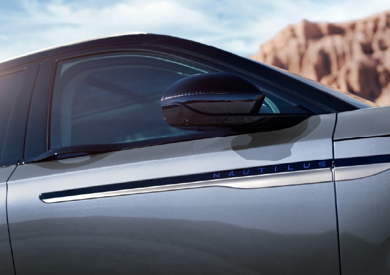 Blue lettering on the side of the vehicle that reads Nautilus indicates the available Hybrid Powertrain. | Don Franklin Lincoln in London KY