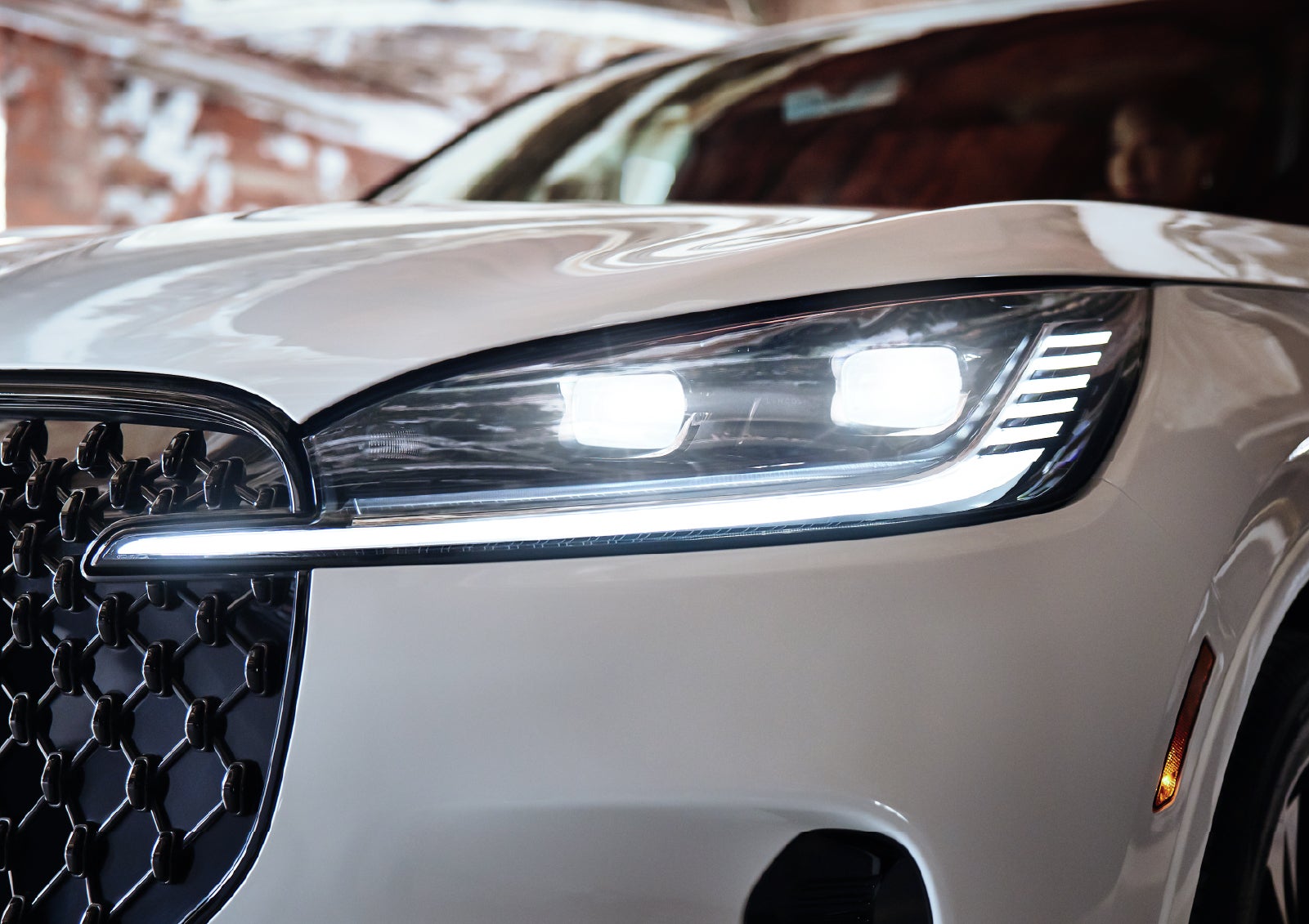 A close-up of a headlamp on the 2027 Lincoln Aviator® SUV is shown. | Don Franklin Lincoln in London KY