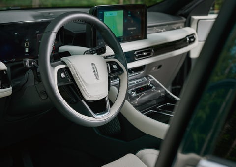 The leather-trimmed steering wheel of a 2027 Lincoln Aviator® Black Label™ SUV. | Don Franklin Lincoln in London KY