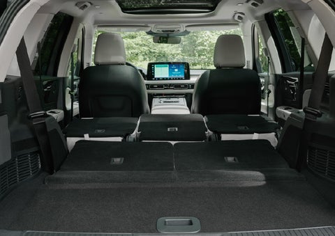 A rear to front view of the interior of a 2027 Lincoln Aviator® Black Label™ SUV shows the third and second rows folded flat | Don Franklin Lincoln in London KY